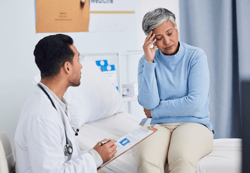 how-stress-and-anxiety-can-worsen-essential-tremors-india-patient-with-doctor